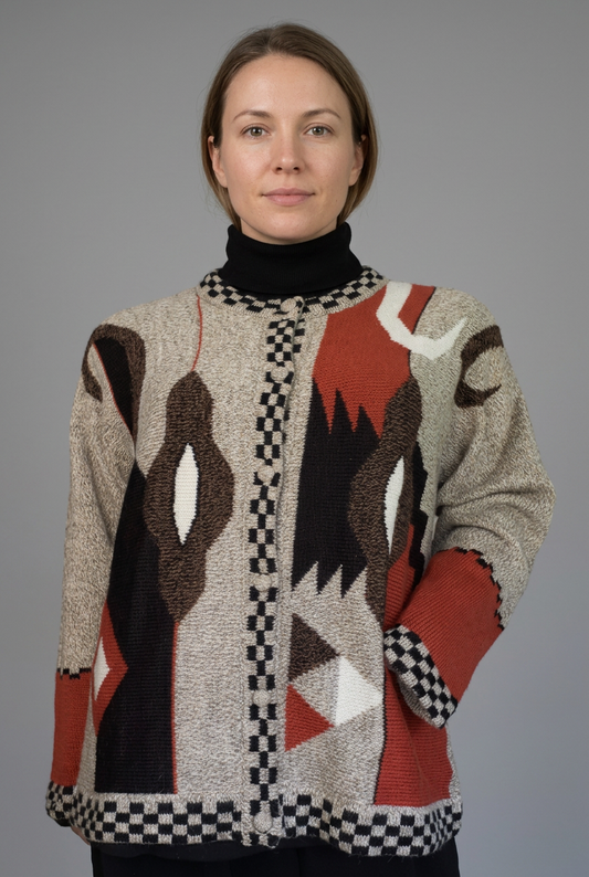 Cream Nazca Lines cardigan with a natural-looking face added to the model
