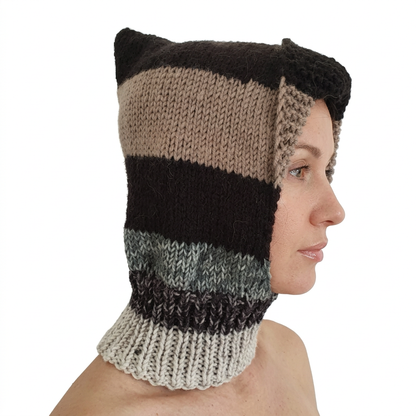 Hand-knitted striped hat and neck warmer on natural-looking model, side view