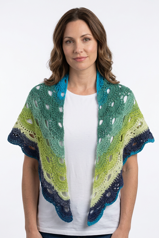 Model wearing the Ocean wrap open over both shoulders